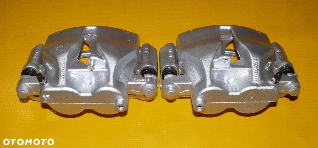 ZACISKI LEWY PRAWY TYŁ VOLKSWAGEN CRAFTER 303/28mm BLIŹNIAK 06r- - 8