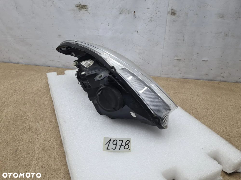 Toyota Corolla E12 04-07r 8117002380 reflektor lampa przednia przód Valeo - 4