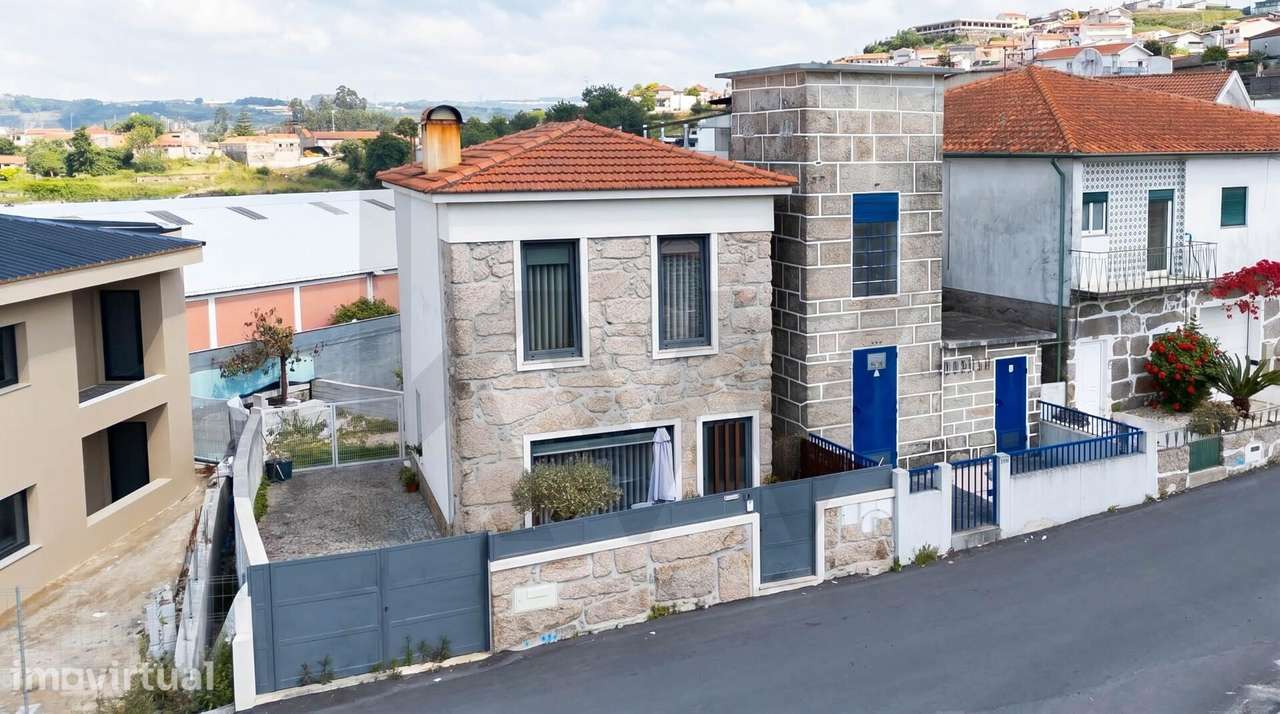 Moradia Unifamiliar em Rebordosa -O Equilíbrio Perfeito entre a Estilo - Grande imagem: 2/27