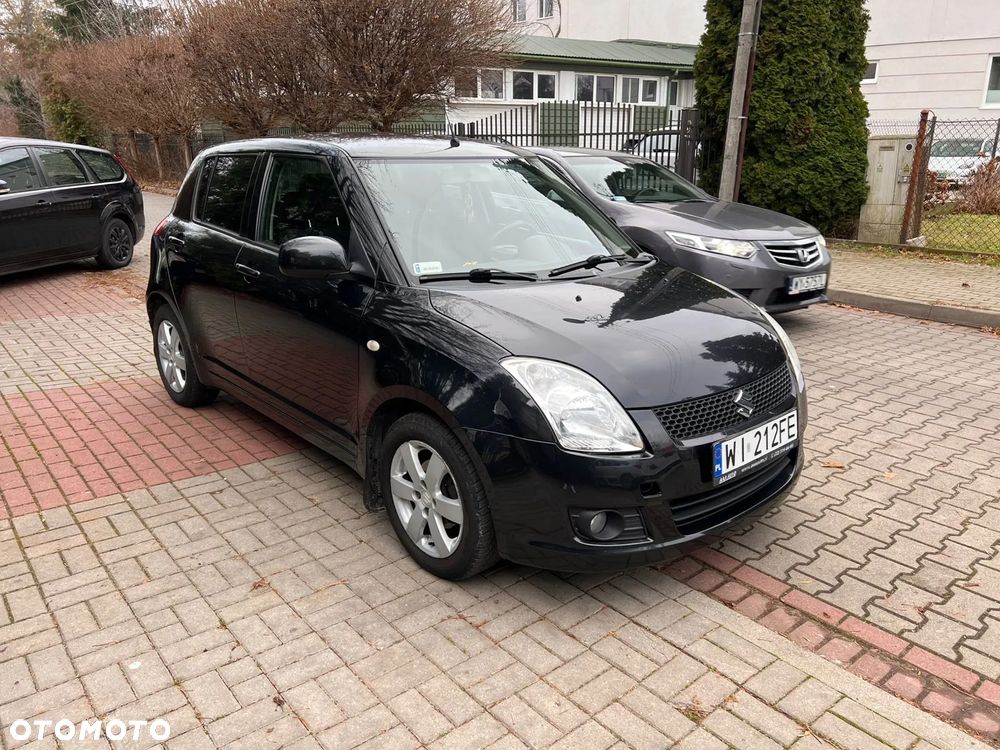 Suzuki Swift 1.3 Club - 4