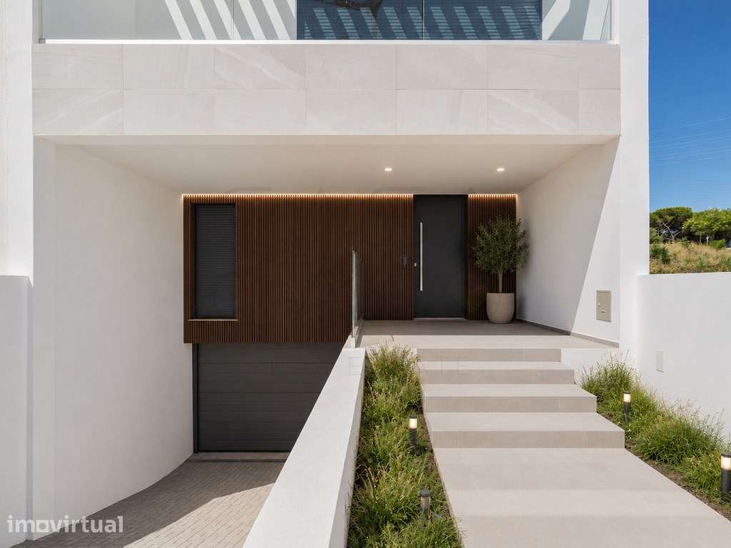 Moradia nova com garagem, piscina e jardim na Quinta da Amizade - Grande imagem: 2/33
