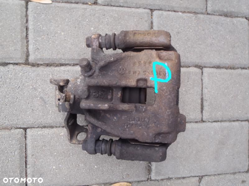 VW T4 96-03 ZACISK HAMULCOWY PRAWY TYŁ TYLNY JARZM