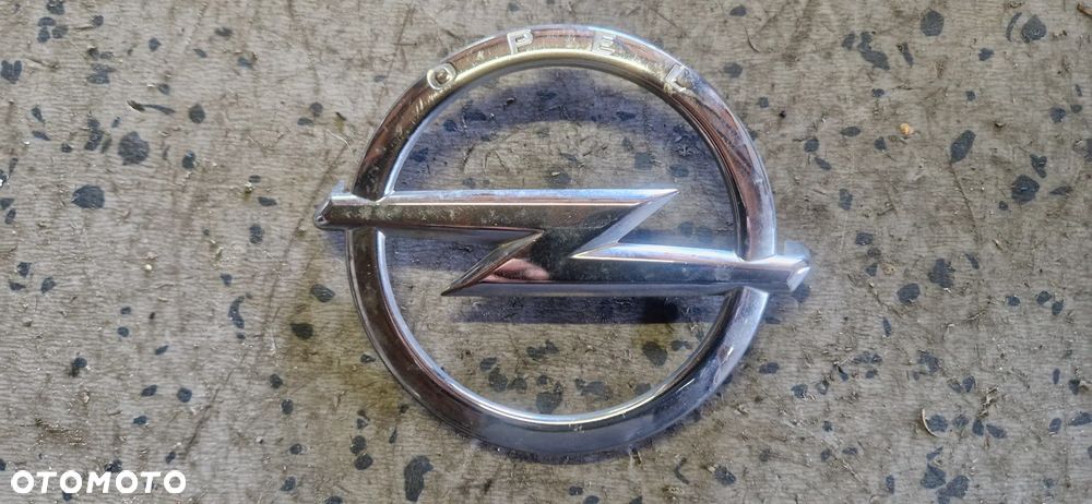 OPEL ASTRA K ZNACZEK EMBLEMAT PRZÓD 13464792 - 1