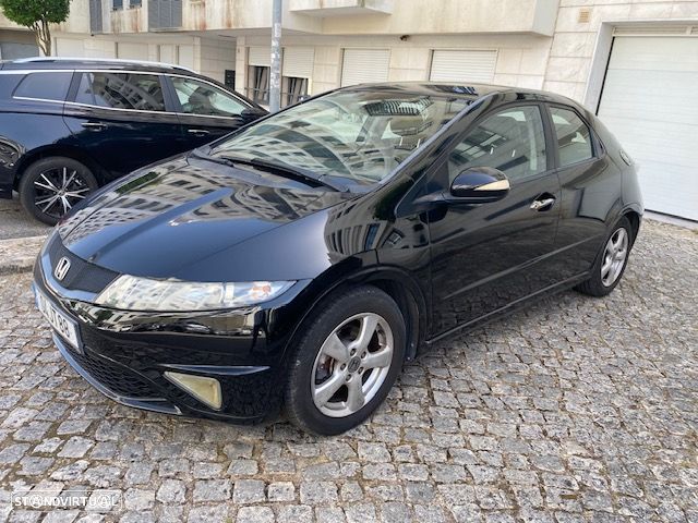 Honda Civic 1.4 i-VTEC Elegance - 1