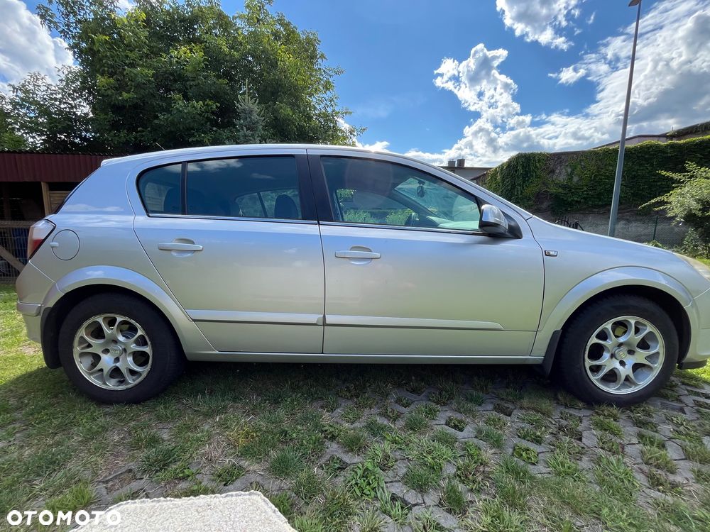 Opel Astra 1.6 Cosmo - 11