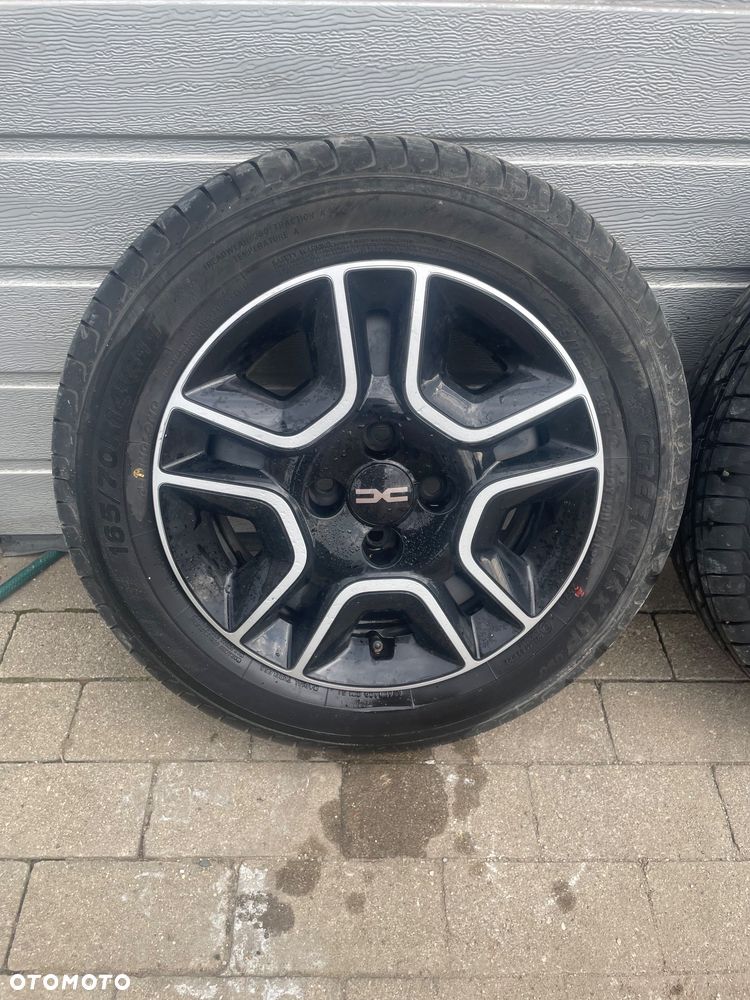 Koło felga kołpak.Dacia Spring - 11