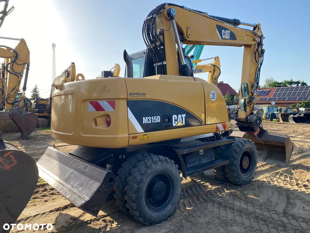 Caterpillar CAT M315D, 7000 MTH, 2014 ROK, Z NIEMIEC, SUPER STAN - 4