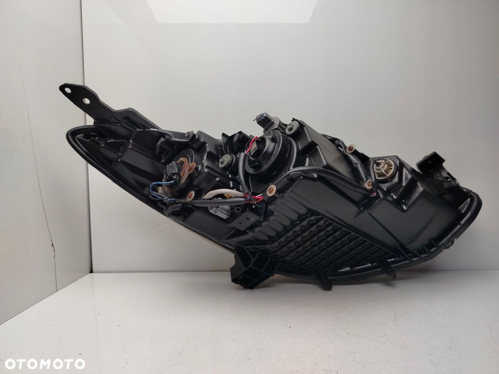 mazda 2 de 2011r reflektor lampa lewy przód lewa przednia soczewka - 8