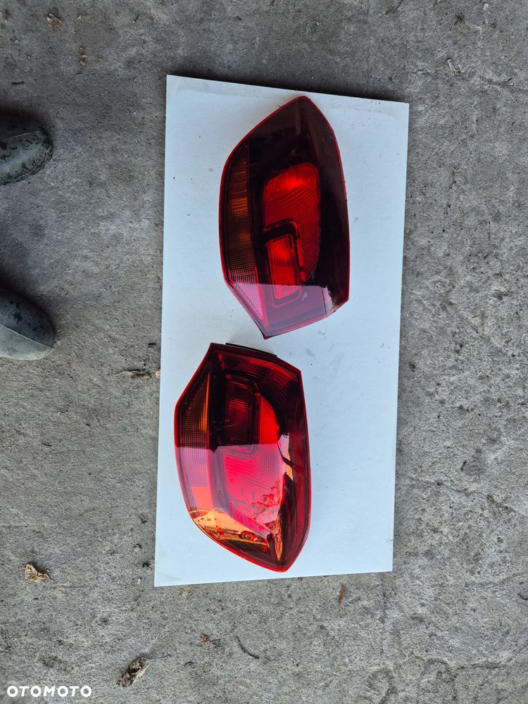 TYLNA LAMPA LEWA OPEL ASTRA J LIFT KOMBI - 1