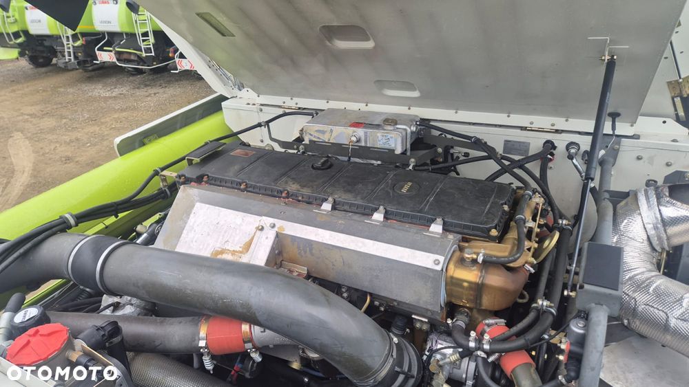 Claas Lexion 780TT z hederem - 7