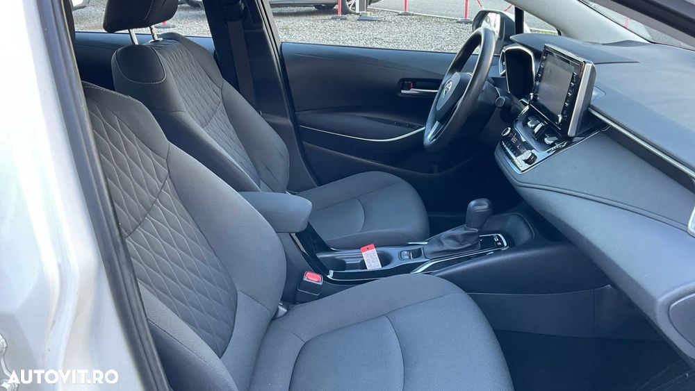 Toyota Corolla Sedan 1.8 HSD Business - 14