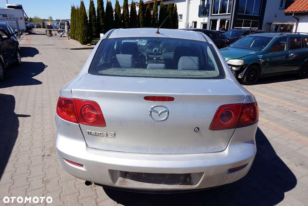 KLAPA BAGAŻNIKA TYLNA 3 I BK SEDAN 22V  SREBRNY MAZDA 2003-2006 - 1