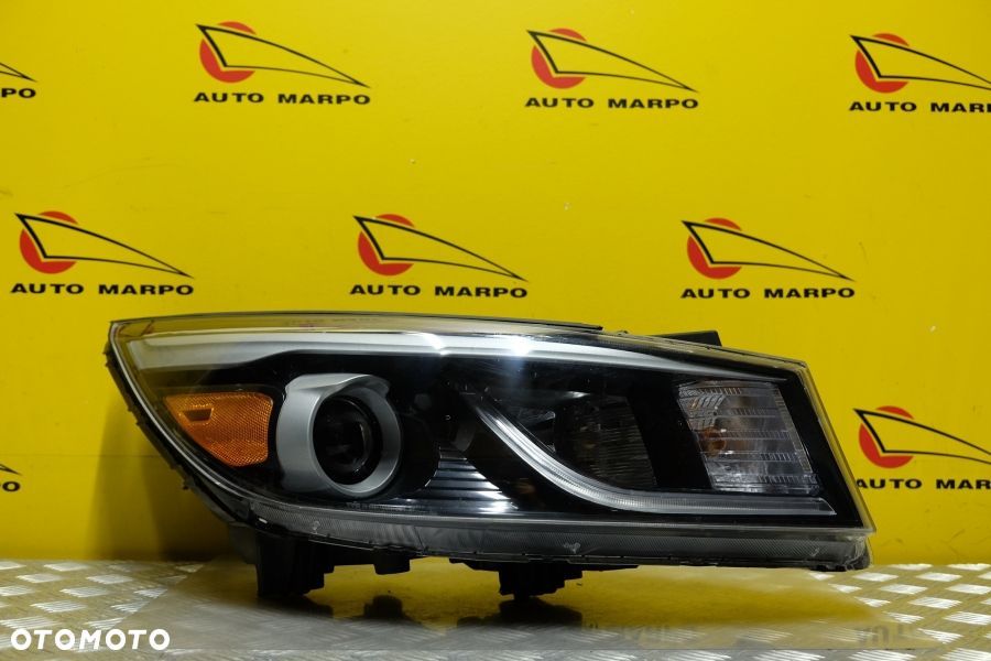 KIA CARNIVAL SEDONA 2015- REFLEKTOR LAMPA ZWYKŁA SOCZEWKOWA Z LED R USA - 2