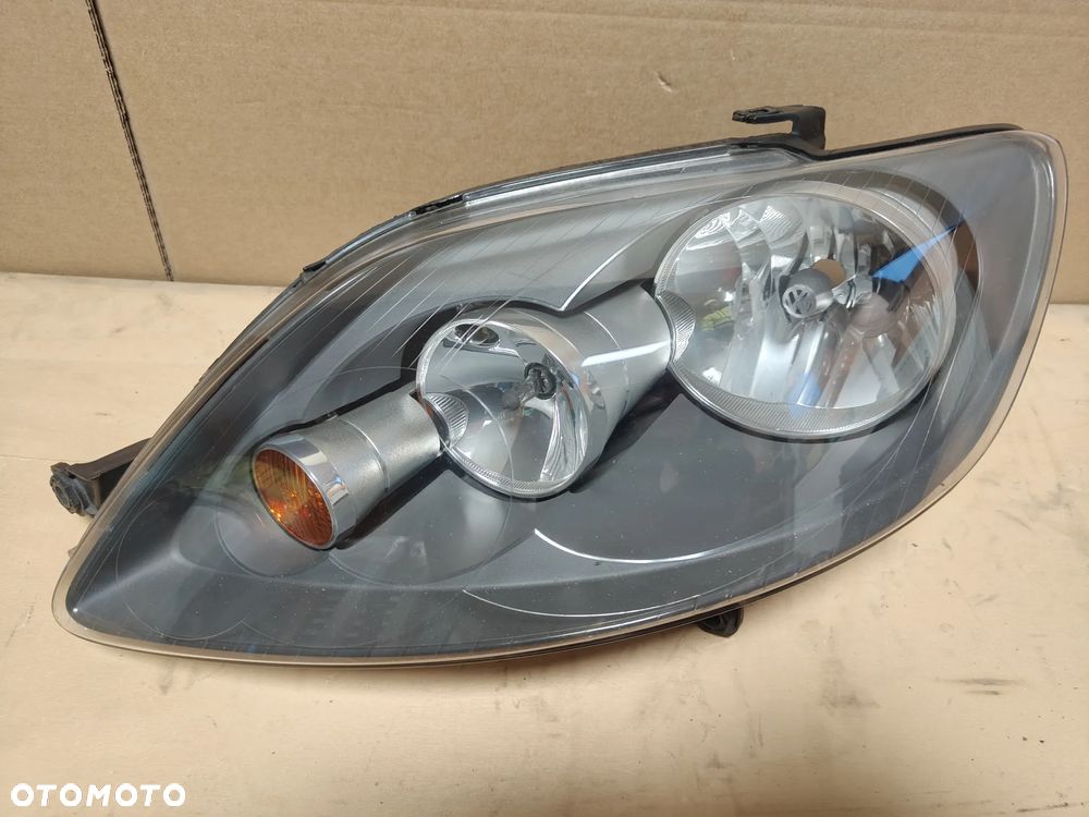 VW Golf 5 V Plus lewy reflektor lampa Europa - 1