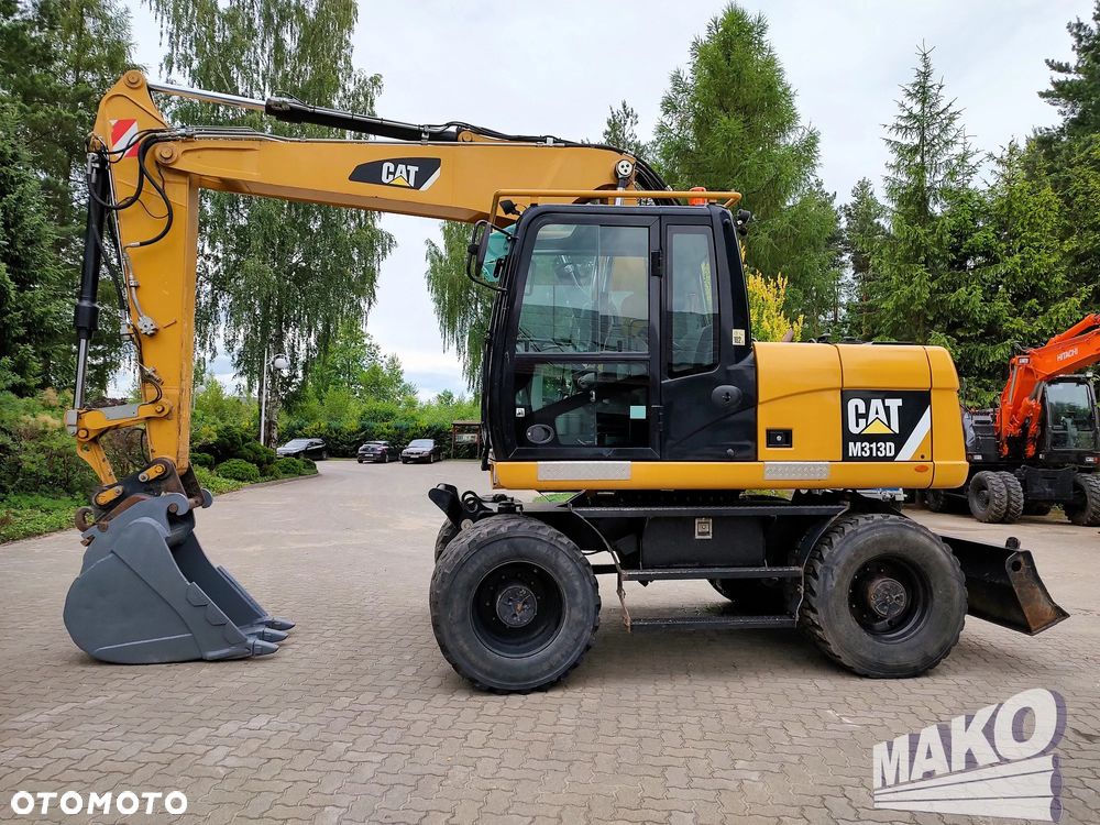 Caterpillar M313D - 1