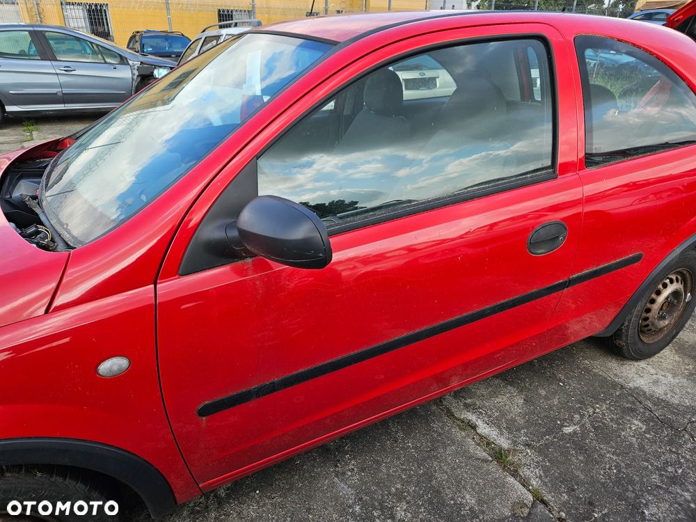 Maska zderzak przedni drzwi lewe prawe błotnik Opel Corsa C 2002r 3d hatchback Z547 - 7