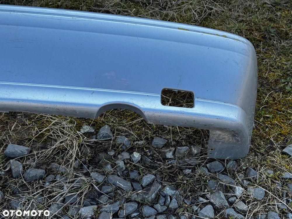 ZDERZAK TYLNY NISSAN	ALMERA N15	1996-1998	OE UŻYWANY	85022-0N000 - 6