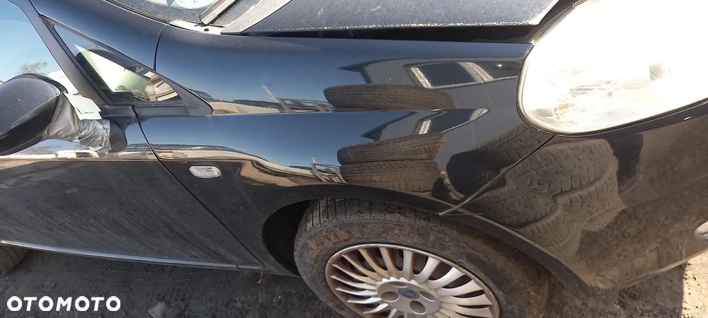 Błotnik przód przedni prawy Fiat Grande Punto 891/B