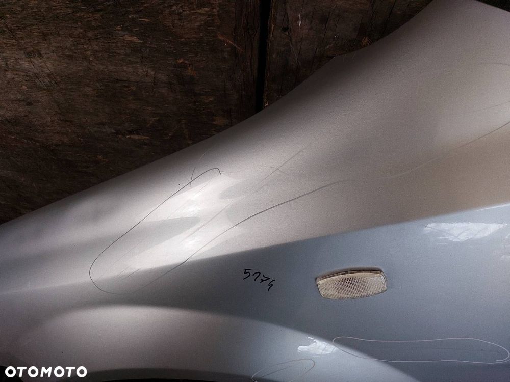 BŁOTNIK LEWY PRZÓD DAEWOO NUBIRA II J200 92U - 2