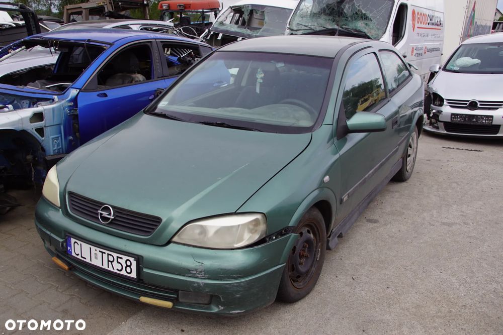 Auto na części - Opel Astra II G 1.6 16V 100 KM X16XEL F17 Z374 1998R Silnik Skrzynia Drzwi Maska Błotnik Zderzak Lampa Lusterko Klamka Szyba Deska Kokpit Sterownik Moduł Czujnik Licznik Panel Kierownica - 1
