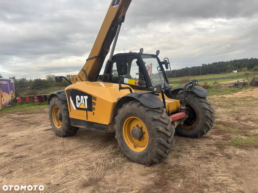Caterpillar TH407 * Ładowarka teleskopowa * Łyżka * Widły * 100% sprawna - 10