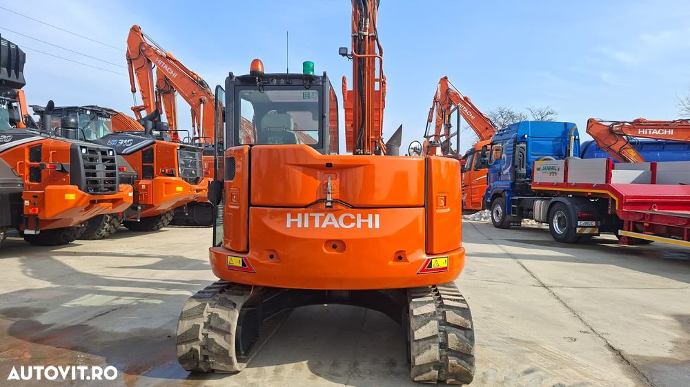 Hitachi ZX85, 2022, 3.339h, CUPLA RAPIDA HIDRAULICA +3 CUPE NOI, senile cauciuc 90%, masa operationala 8,6t, adanc sapare 5m, latime 2,2m, ridica 4,5t, inst picon, LAMA NIVELARE, aer cond, Camera spate, leasing 4 ani, STARE FOARTE BUNA, PROMOTIE 59.900eur+Tv - 25