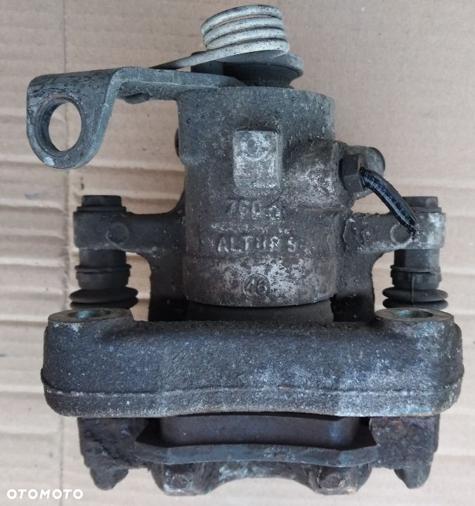 Citroen C4 I Peugeot 308 T7 zacisk hamulcowy tyl tylny  prawy lewy - 7