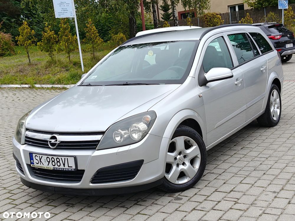 Opel Astra 1.9 CDTI Caravan DPF Cosmo - 1