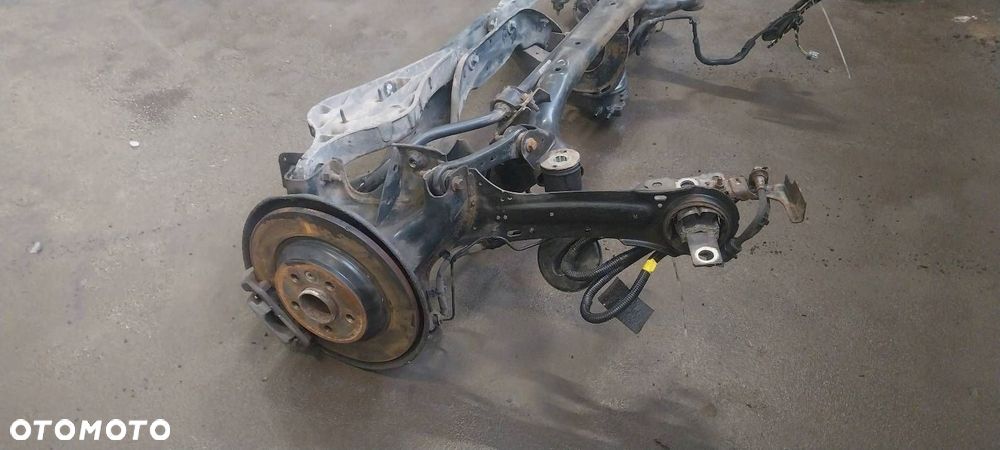 KOMPLETNE ZAWIESZENIE BELKA SANKI TYŁ HAMULCE AMORTYZATORY VOLVO S60 II - 2