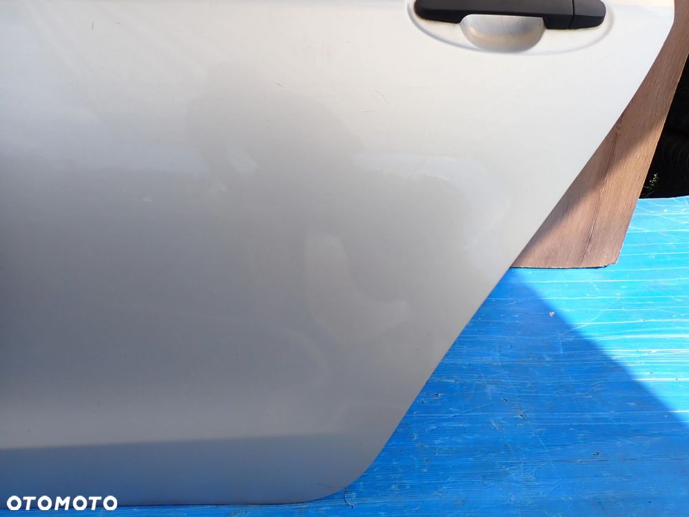 TOYOTA YARIS II 06-11 5d DRZWI TYLNE LEWE 1E7 - 8