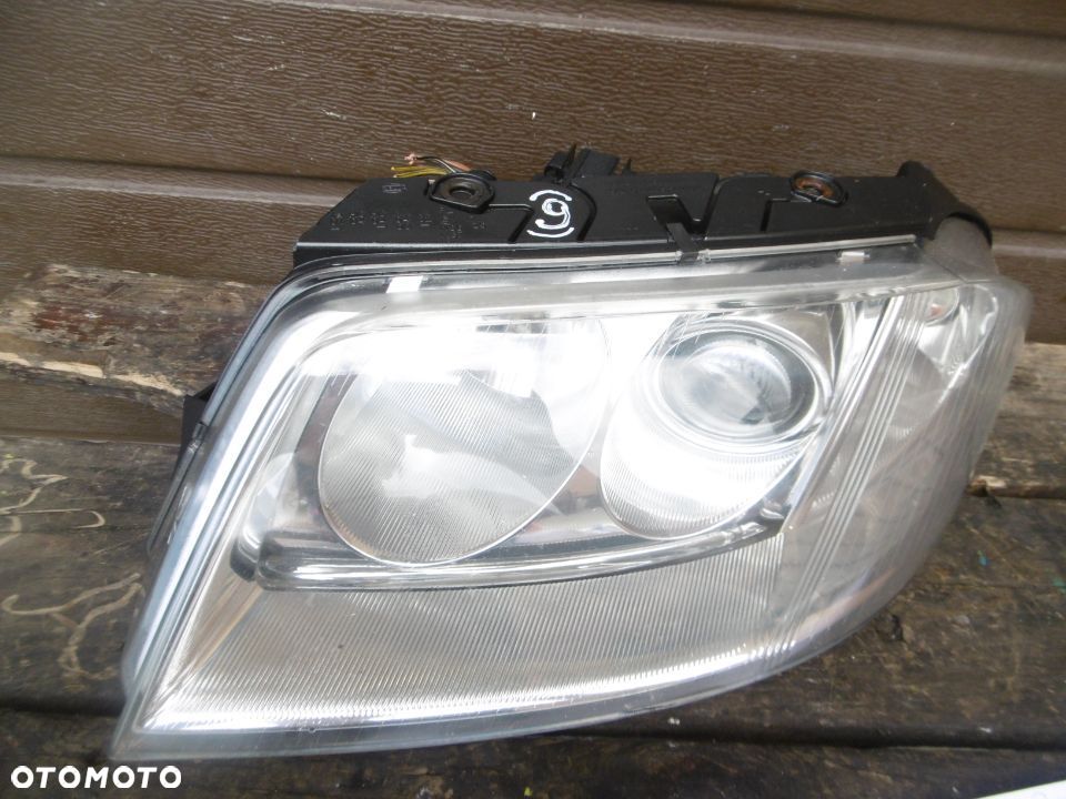 Lampa lewa VW PASSAT B5 LIFT HELLA EUROPA - 2