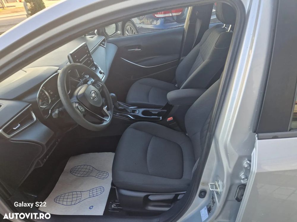 Toyota Corolla Sedan 1.8 HSD Business - 9