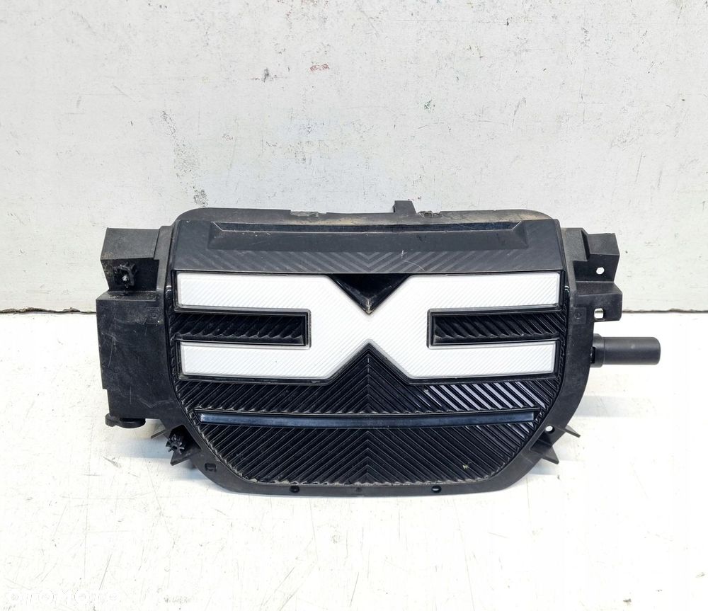 Dacia Spring EV Grill atrapa gniazdo ładowania zaślepka