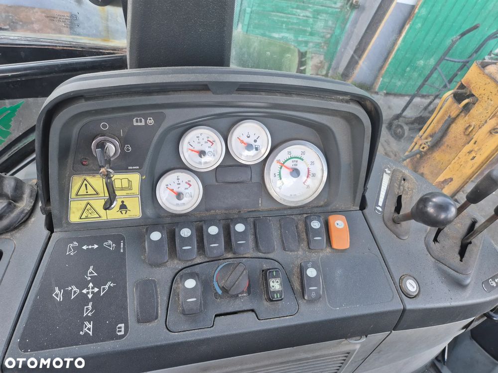 Caterpillar 428 E - 11