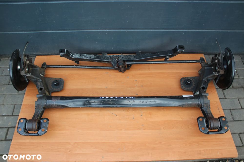 BELKA ZAWIESZENIA TYŁ TYLNA OPEL ZAFIRA C DIESEL 5X115 KOMPLETNA Z PIASTAMI - 1