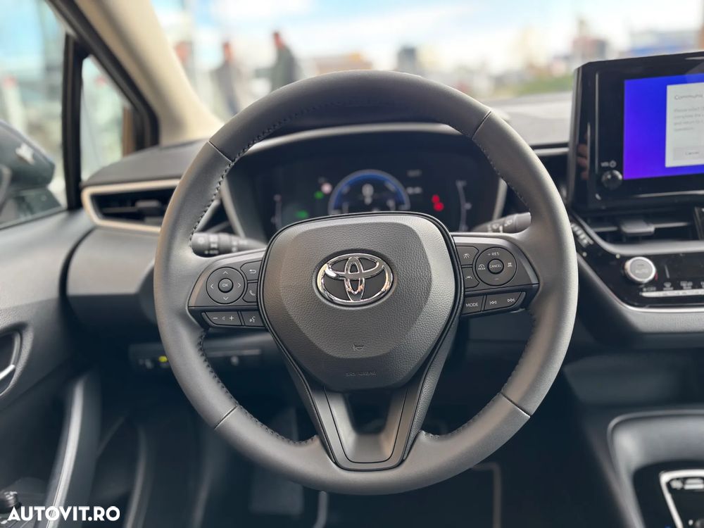 Toyota Corolla Sedan 1.8 HSD Eco - 18