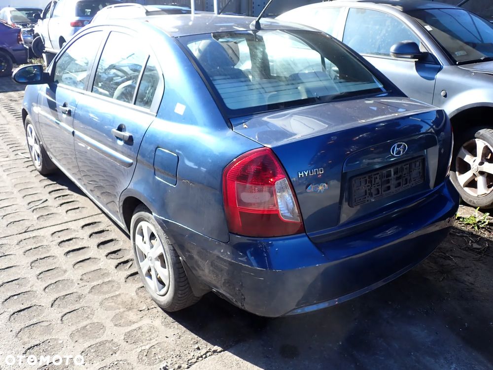 CZĘŚCI - Hyundai Accent III MC 1,4 16V 71KW 97KM G4EE SEDAN LAKIER KQ 2007r. INDEX - 9082 - 3