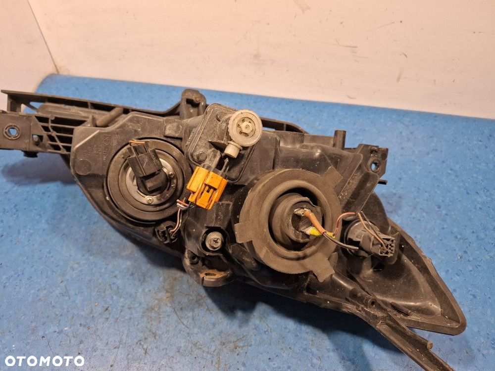 MAZDA 3 06-09 REFLEKTOR LEWY - 12