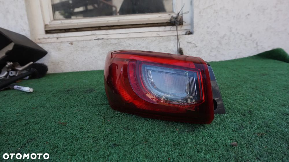 Mazda CX-3 lampa tylna lewa w blotnik