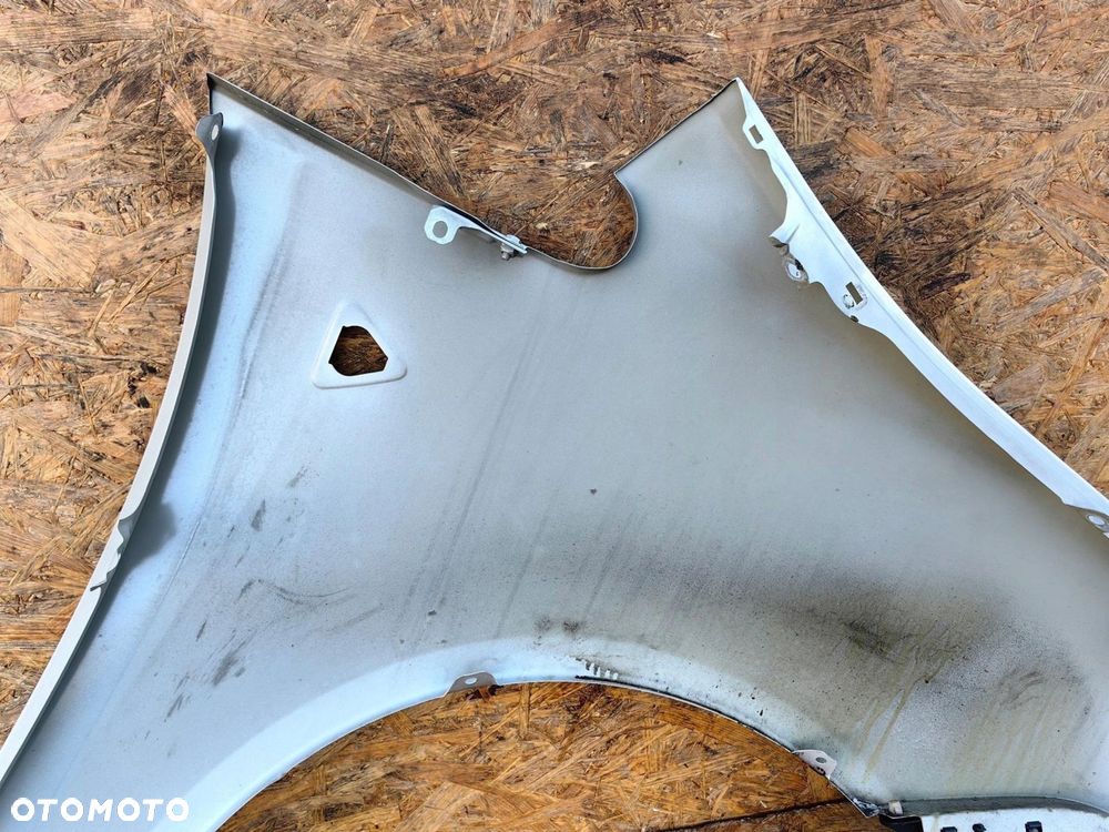 Błotnik LEWY PRZÓD MITSUBISHI COLT Z30 VI LIFT kolor 56A oryginał 5D - 6