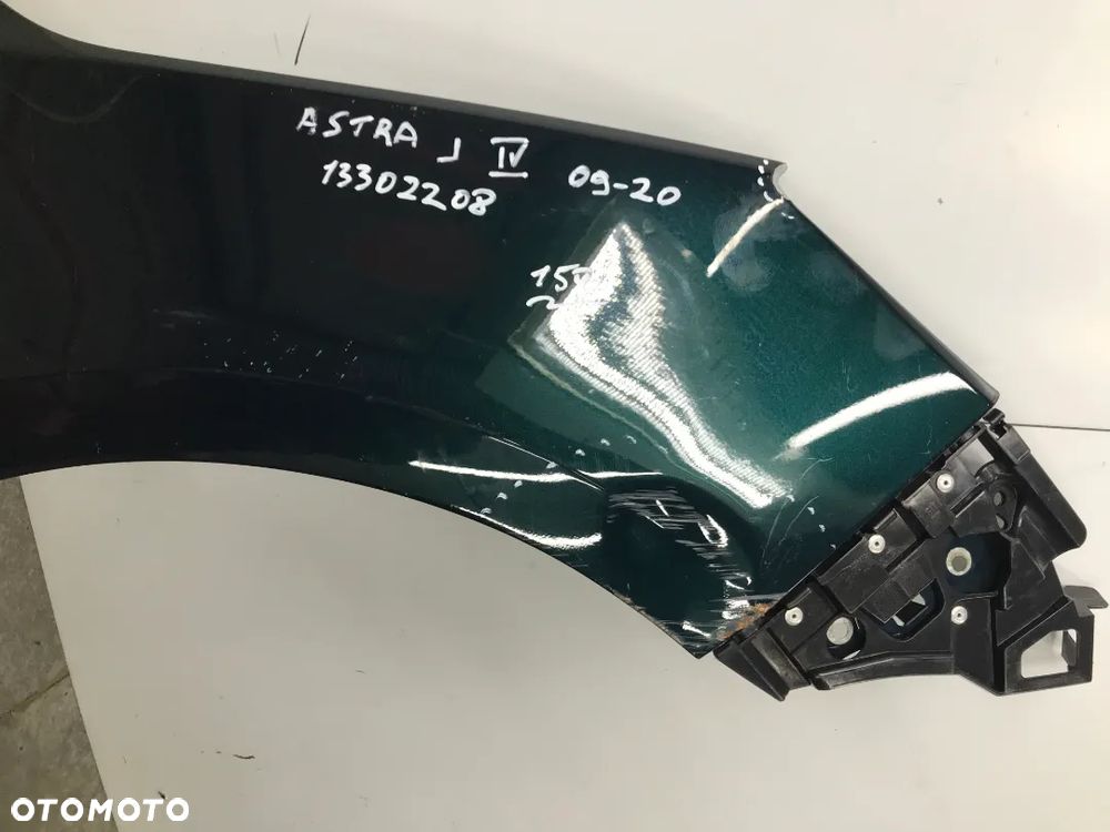 Błotnik Opel astra j IV 09-20 prawy 13302208 - 2