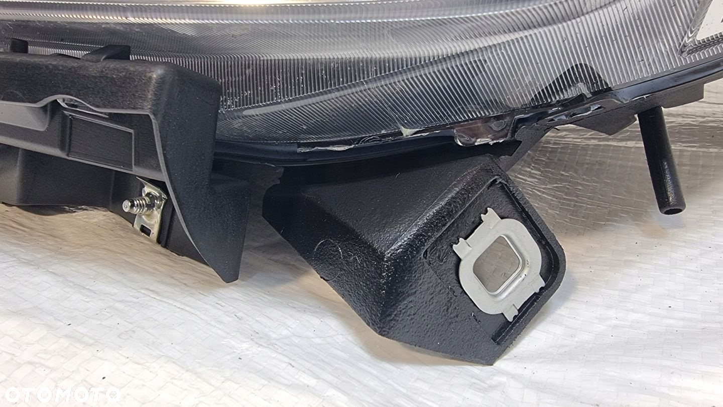 Opel Combo D lampa lewa przód 520868580E - 4