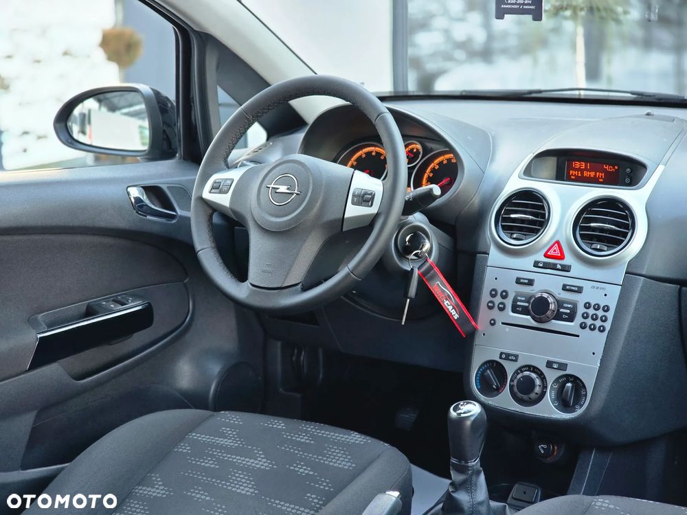 Opel Corsa 1.4 16V Satellite - 23