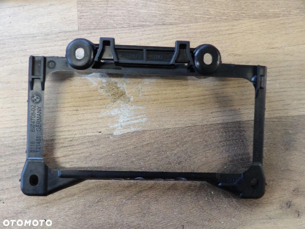 BMW - E60,E61 - OSŁONA , RAMKA , UCHWYT , MOCOWANIE KONSOLI - 6974708 - 1