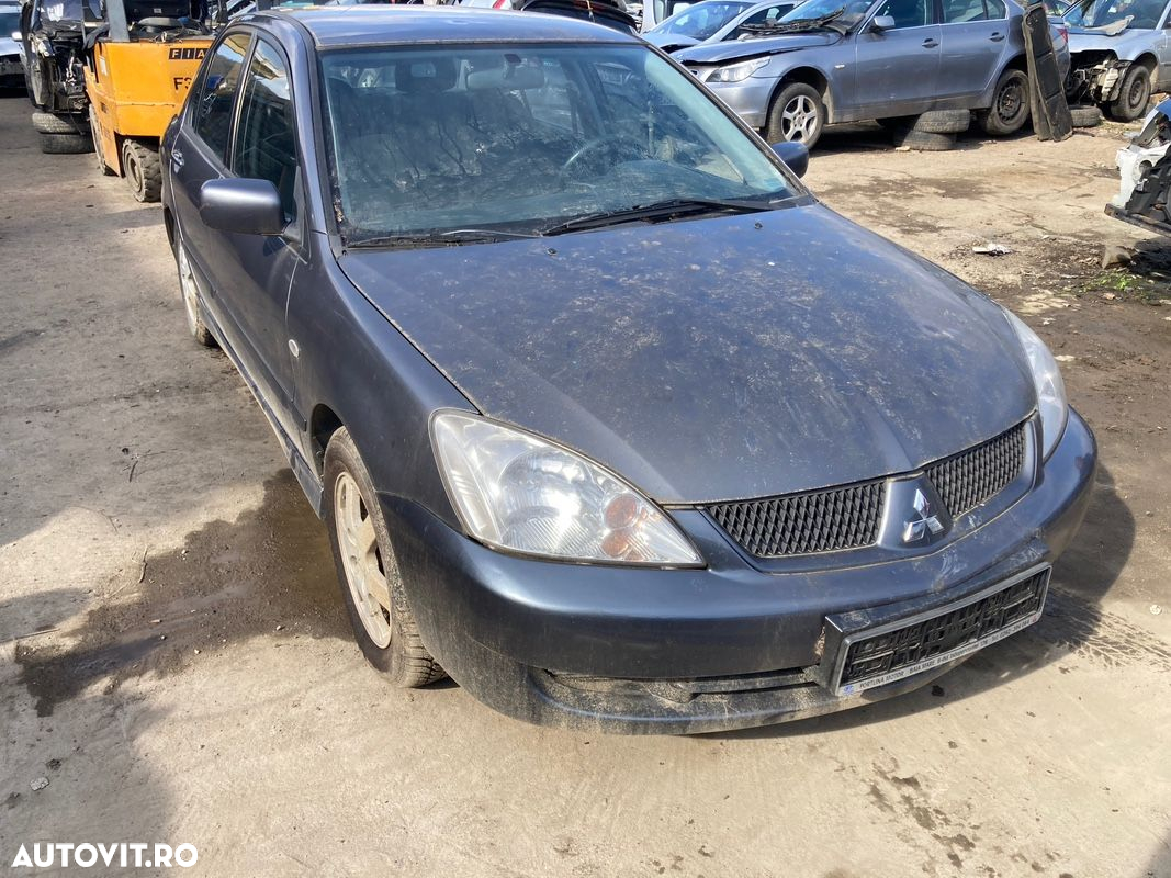 Dezmembrez Mitsubishi Lancer 1.6i 2006 4G18 - 2