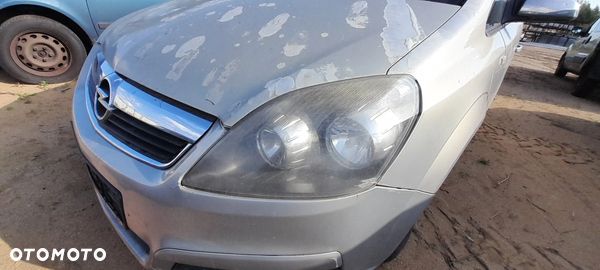 OPEL ZAFIRA B II LAMPA LEWY PRZÓD PRZEDNIA LEWA nr. 13/9
