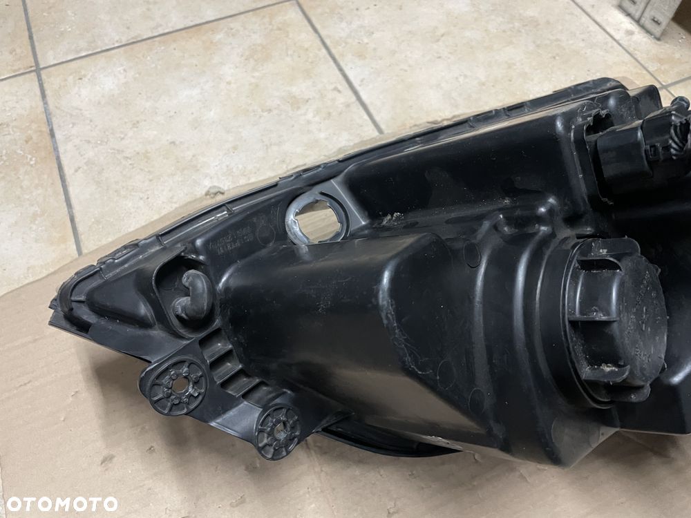 Lampa / reflektor Kia Sorento I - lewy przód (ORYGINALNE) - 4