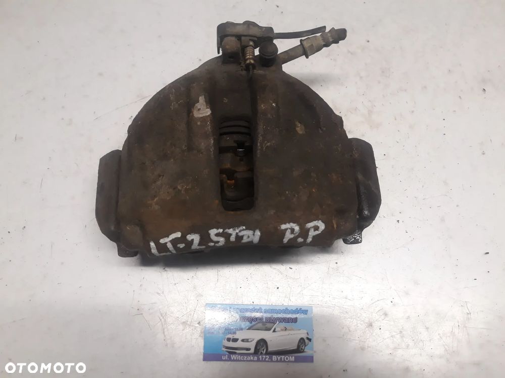 ZACISK PRAWY  PRZÓD VOLKSWAGEN LT 35  2,5 TDI  2000r - 1