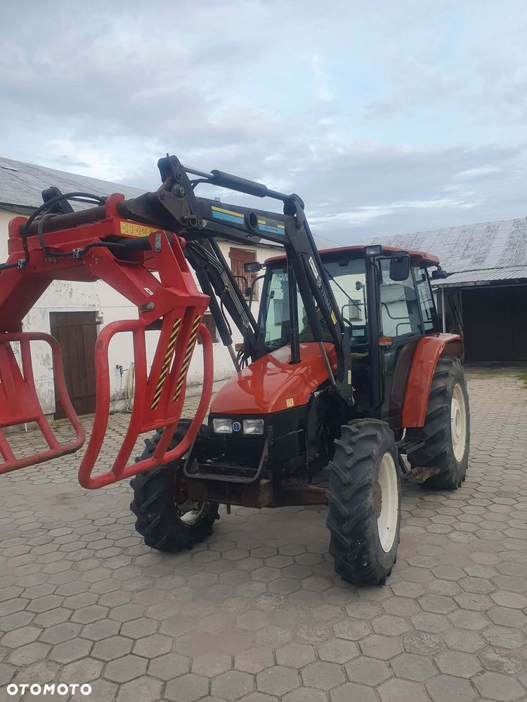 New Holland L65 DT z turem - 1