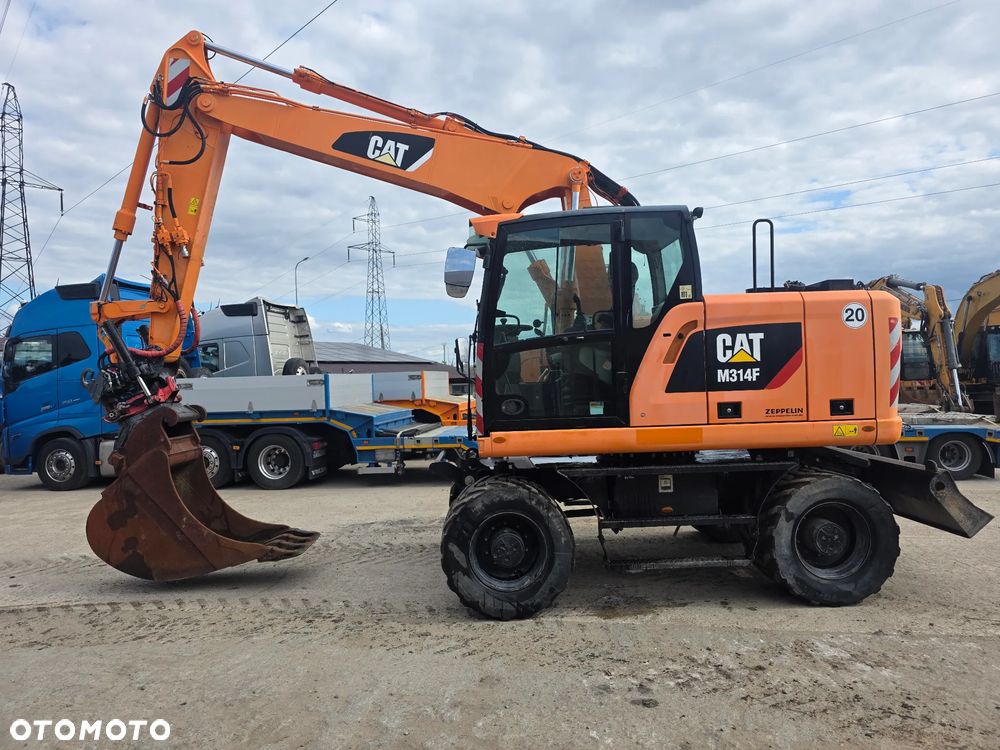 Caterpillar Cat M314F Rototil z Niemiec